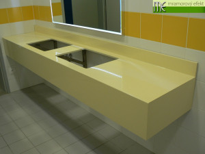 The Park of Science and Technology in Ostrava_blue and yellow countertops with rectangular holes for  integrated ceramic washbasins