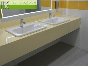 The Park of Science and Technology in Ostrava_blue and yellow countertops with rectangular holes for  integrated ceramic washbasins