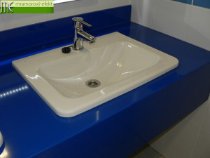 The Park of Science and Technology in Ostrava_blue and yellow countertops with rectangular holes for  integrated ceramic washbasins