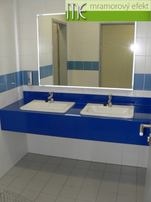 The Park of Science and Technology in Ostrava_blue and yellow countertops with rectangular holes for  integrated ceramic washbasins