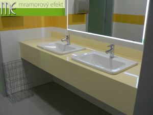 The Park of Science and Technology in Ostrava_blue and yellow countertops with rectangular holes for  integrated ceramic washbasins